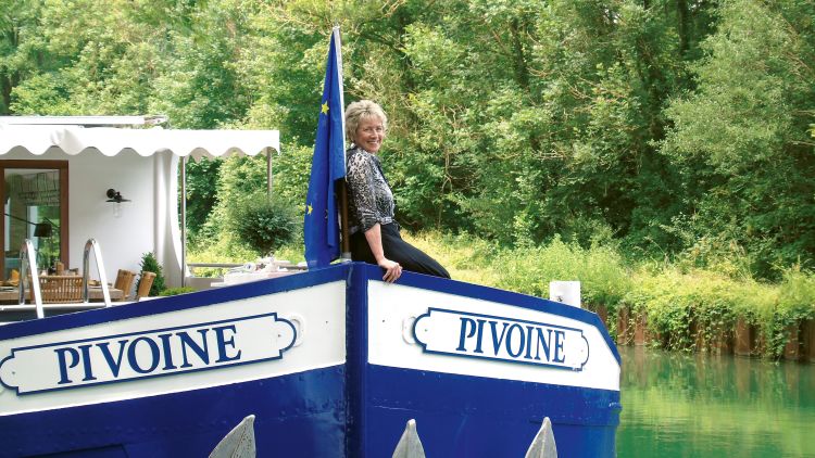 Jill Jergel on the bow of the Pivoine, Belmond’s new eight-passenger barge, on an agent cruise in June in Champagne, France. Barge cruising in France makes up between 50% and 70% of Jergel’s business at Frontiers International Travel in Gibsonia, Pa.