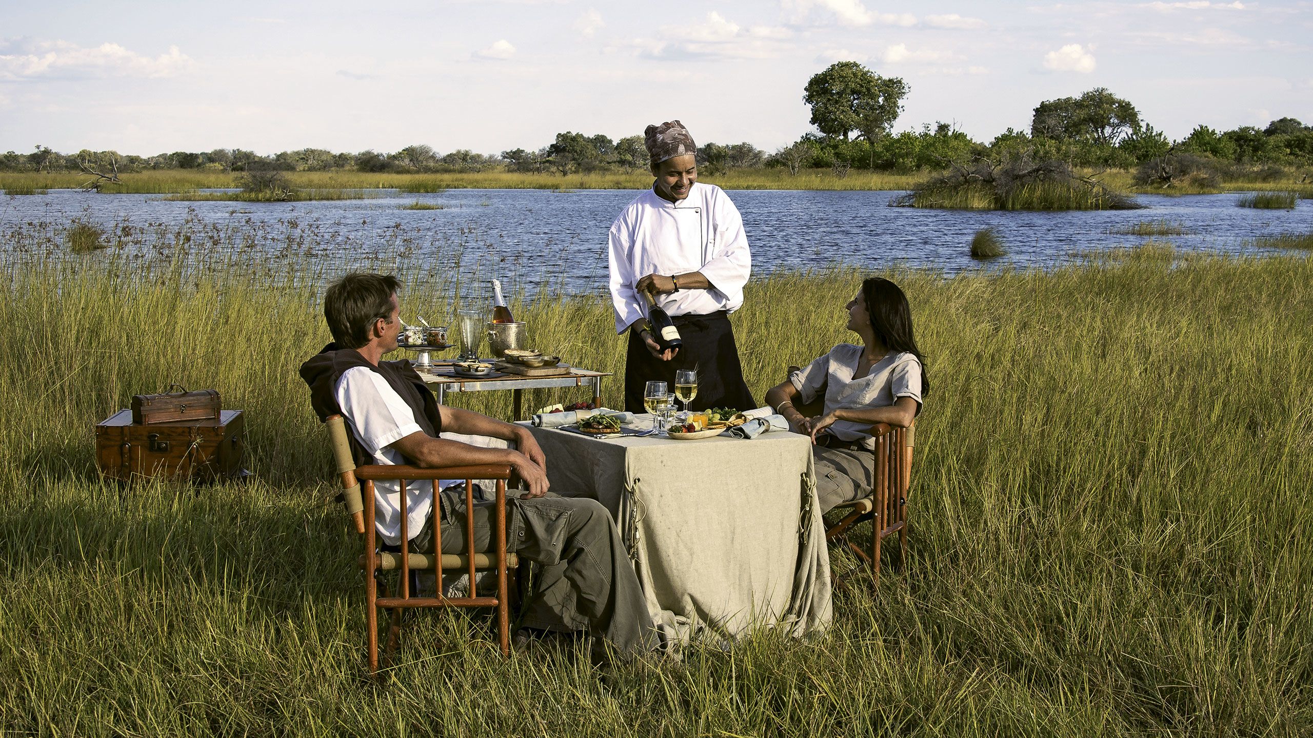 A bush picnic is an unforgettable and luxurious experience. Surrounded by the sights and sounds of the African bush, travelers can enjoy the luxury of silence. Photo courtesy of Wilderness Safaris/Dana Allen