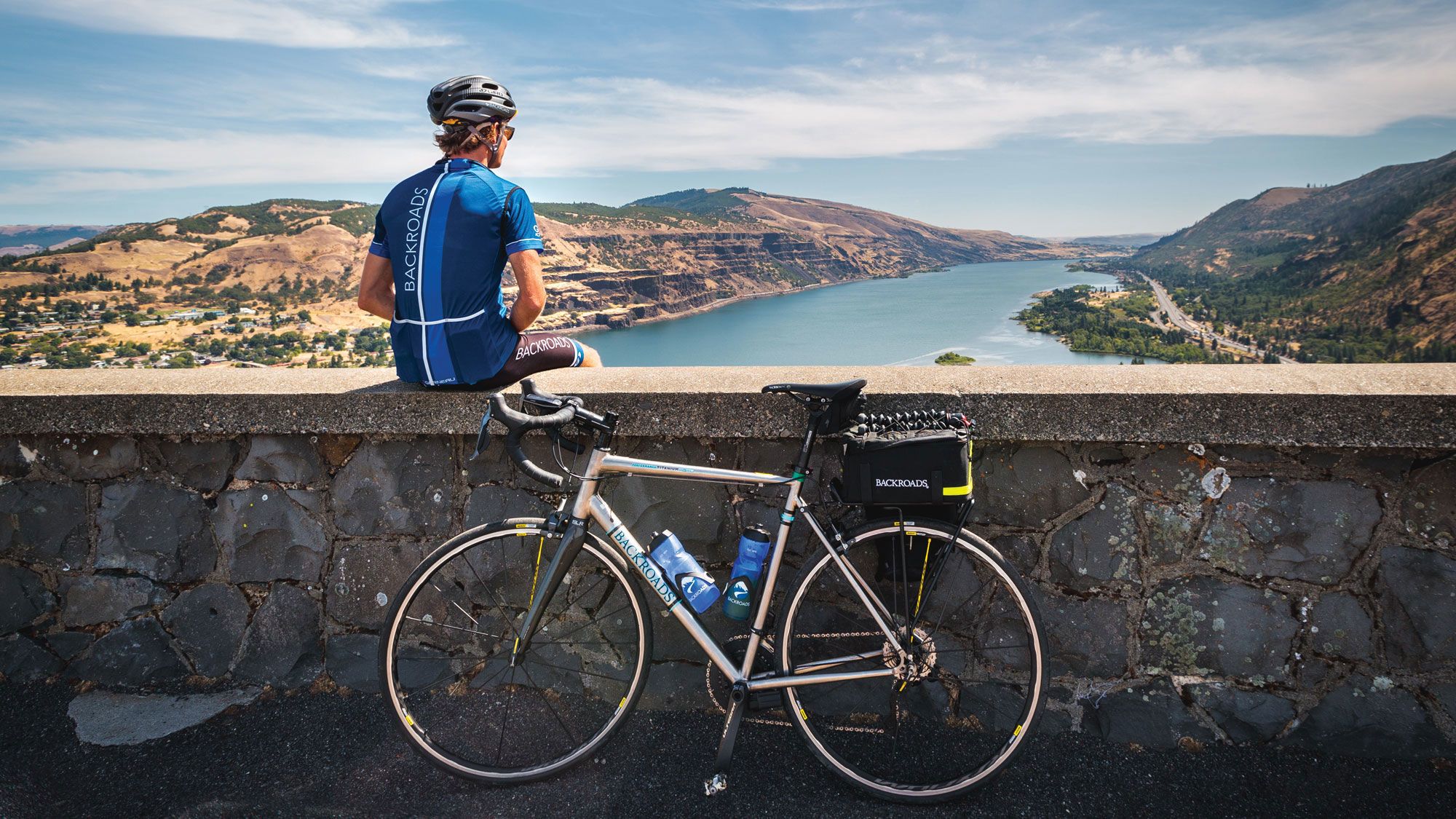 A cyclist pauses to take in the view on Backroads’ Columbia River Gorge Bike Tour. (Photo by Andrew Opila/Backroads)