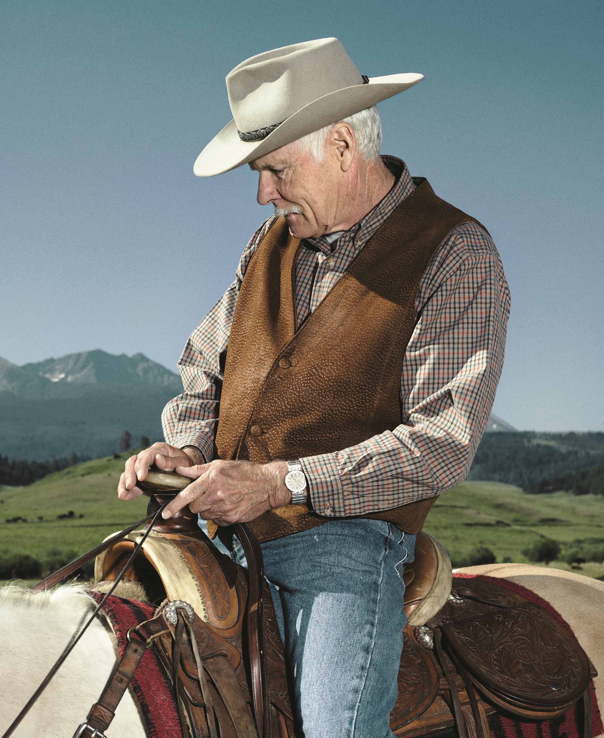 Ted Turner, the second-largest individual landholder in North America, riding at one of his ranches. Photo by Roger Moenks