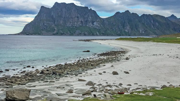 The rugged, idyllic Uttakleiv Beach, which is ill-equipped to handle the tens of thousands of tourist it receives. The village of Uttakleiv has 12 year-round residents. Photo by William Nash